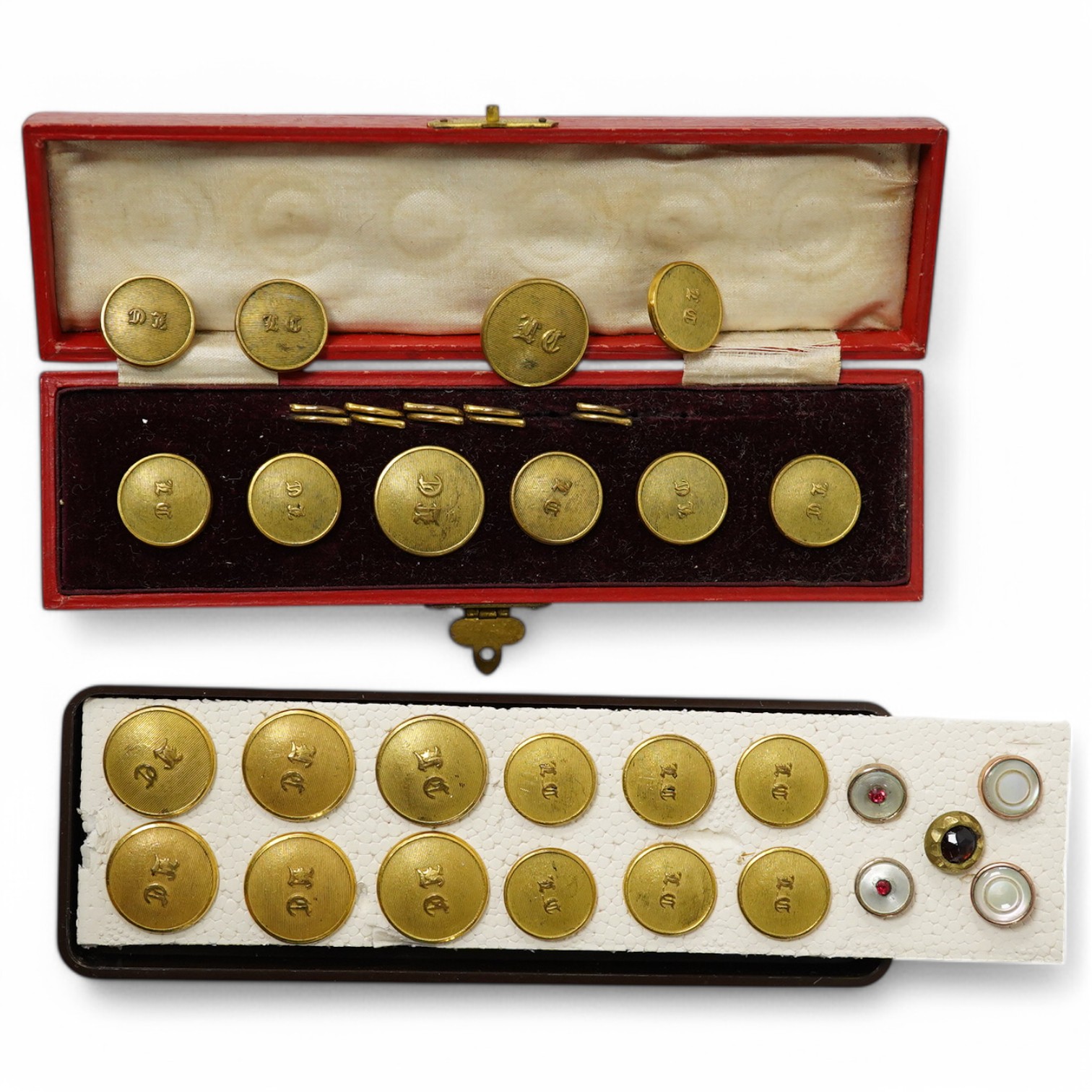 A set of 22 late 19th century gilt brass 'M.C.' (Merton College, Oxford) buttons. Condition - good